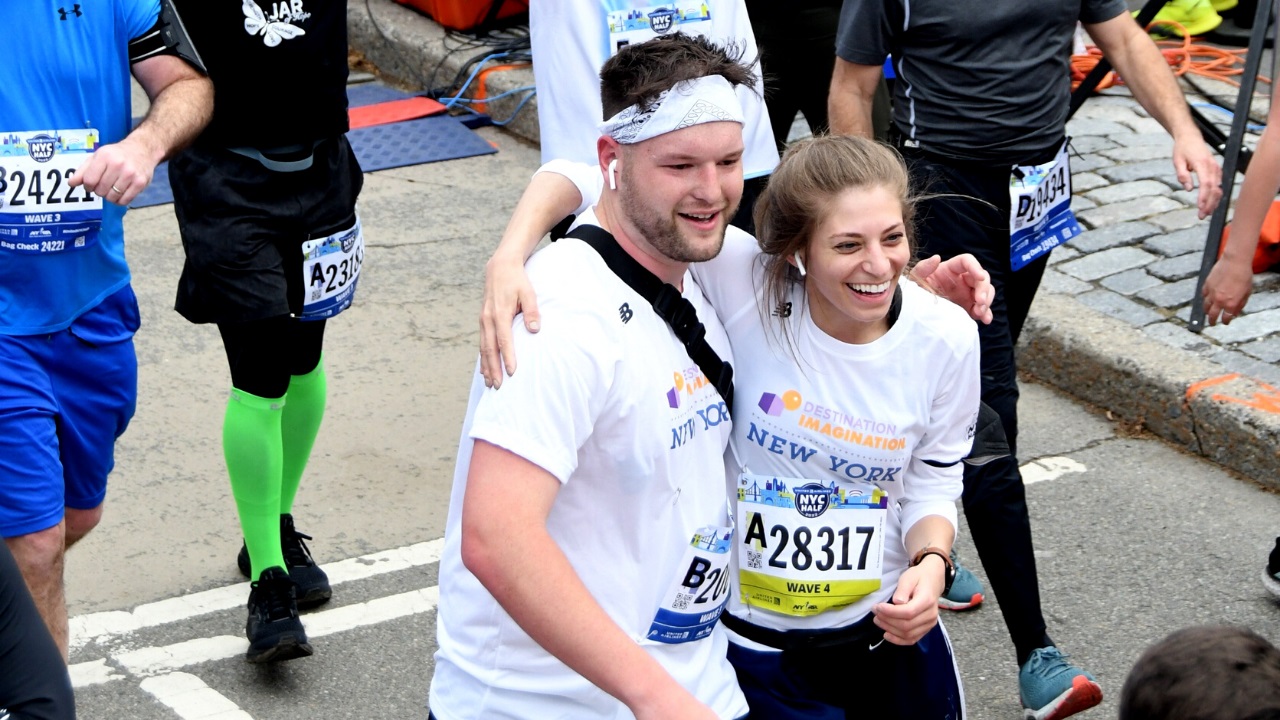 Photo of two Destination Imagination New York volunteers running the NYC Half Marathon