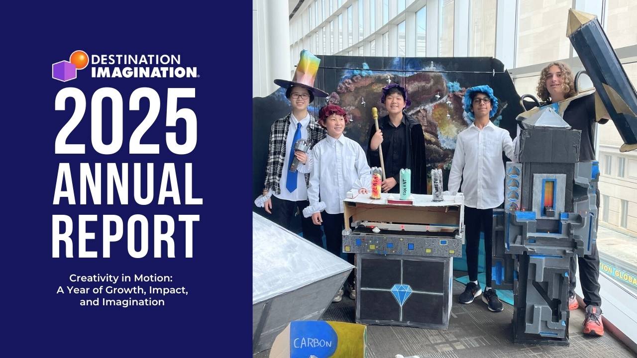 Five students stand indoors next to a large, team-built display made of cardboard and painted materials. The display includes tall structures, boxes, and props. On the left side of the image is text reading “Destination Imagination 2025 Annual Report.”