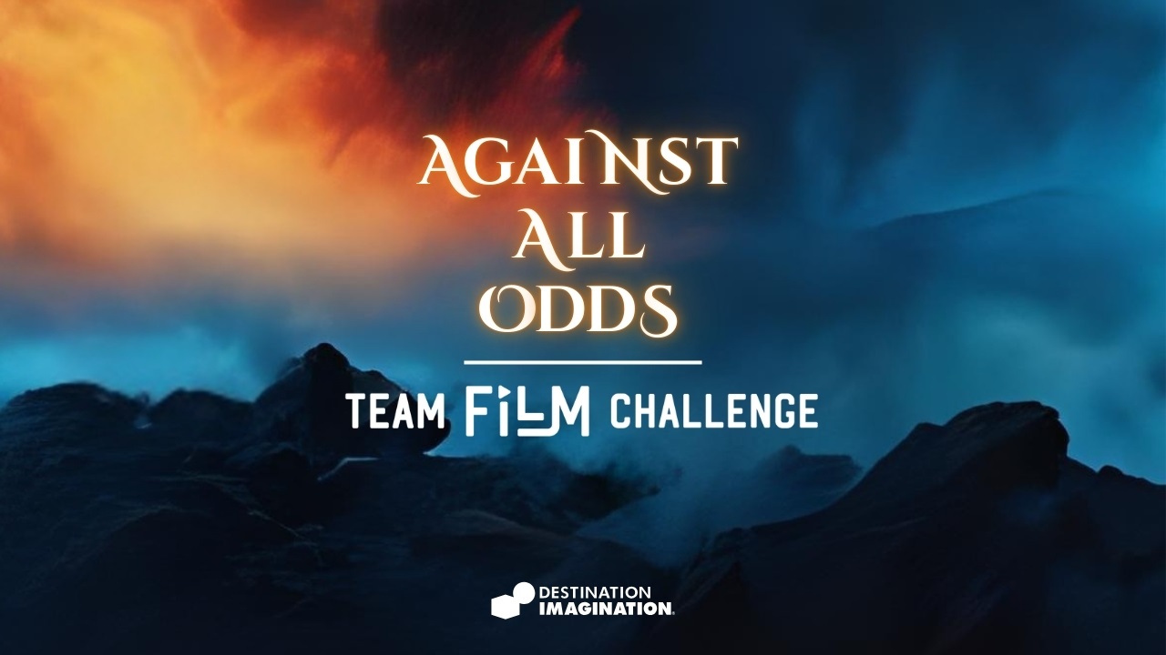 Image of rocks with smoke on top. Text says, "Against All Odds, the Destination Imagination Team Film Challenge."
