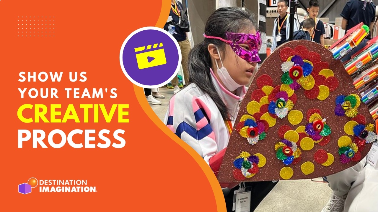Photo of a Destination Imagination participant with a large, colorful hand prop. Text says, "Show us your team's creative process."