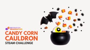 Halloween candy cauldron with bat and candy corn crafts coming out the top.