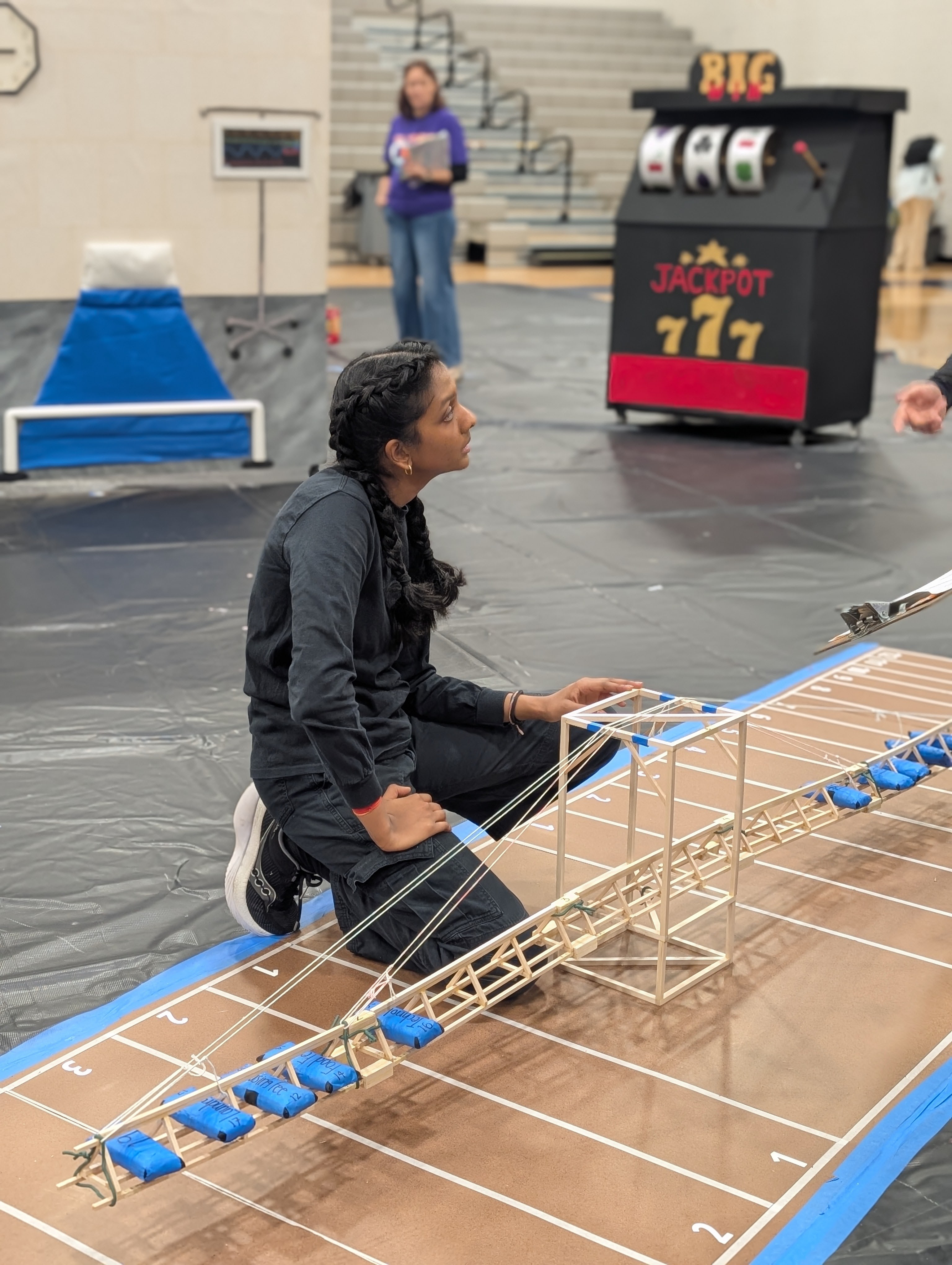 Teams test their engineering solutions during a Destination Imagination tournament in Texas.